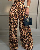 Leopard Print Chain Strap Plunge Jumpsuit